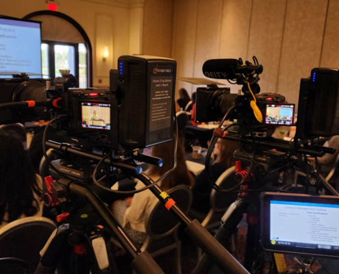 photo of multi-camera set up inside corporate event